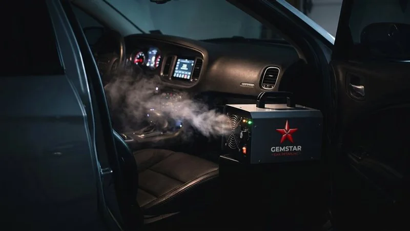 Steam cleaning headliner to remove embedded smoke residue and tar